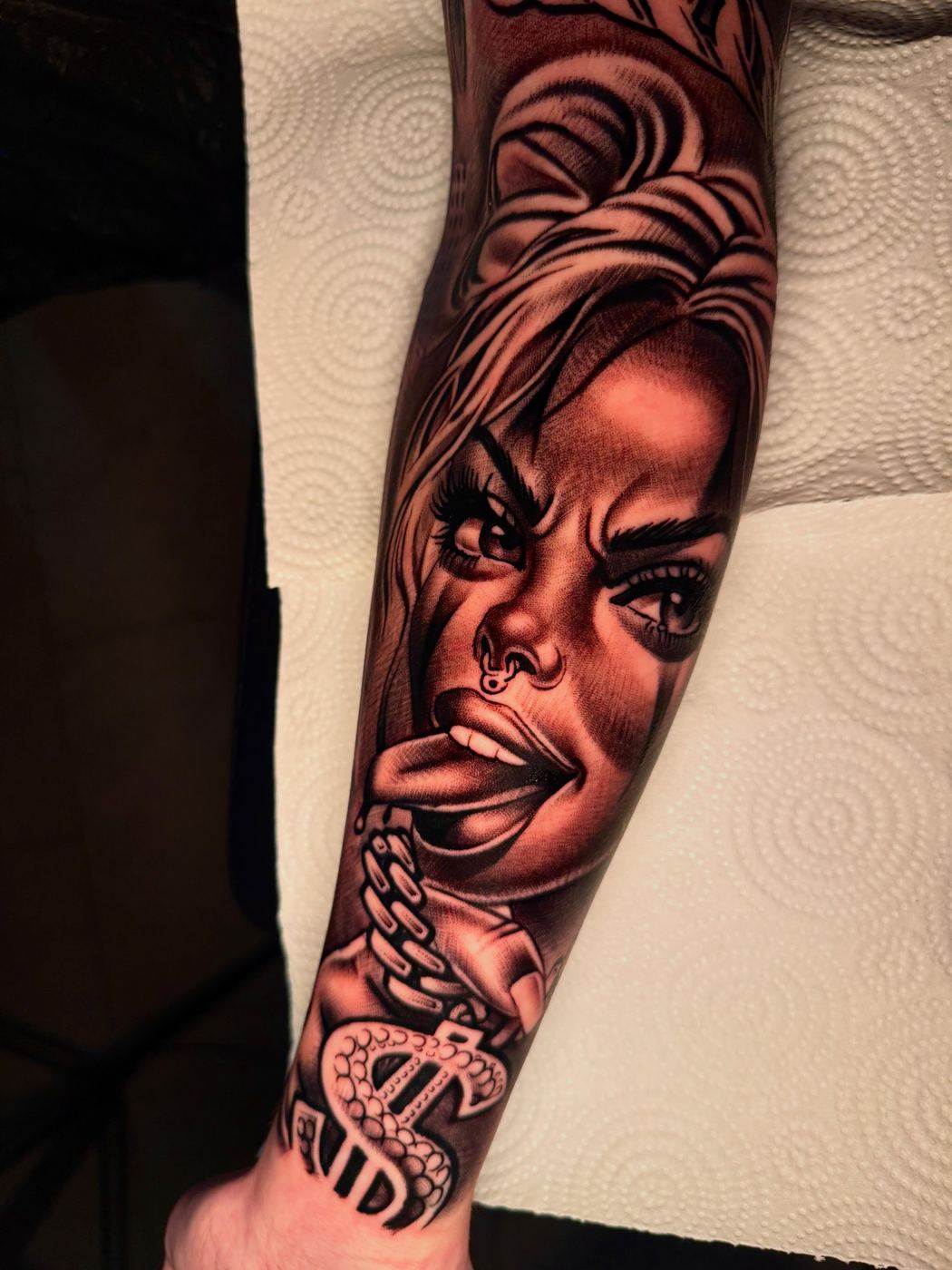 Chicano girl forearm tattoo